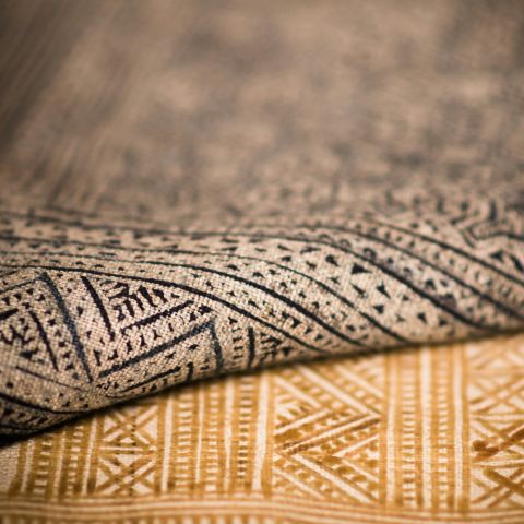 Close up texture of two different patterned rugs